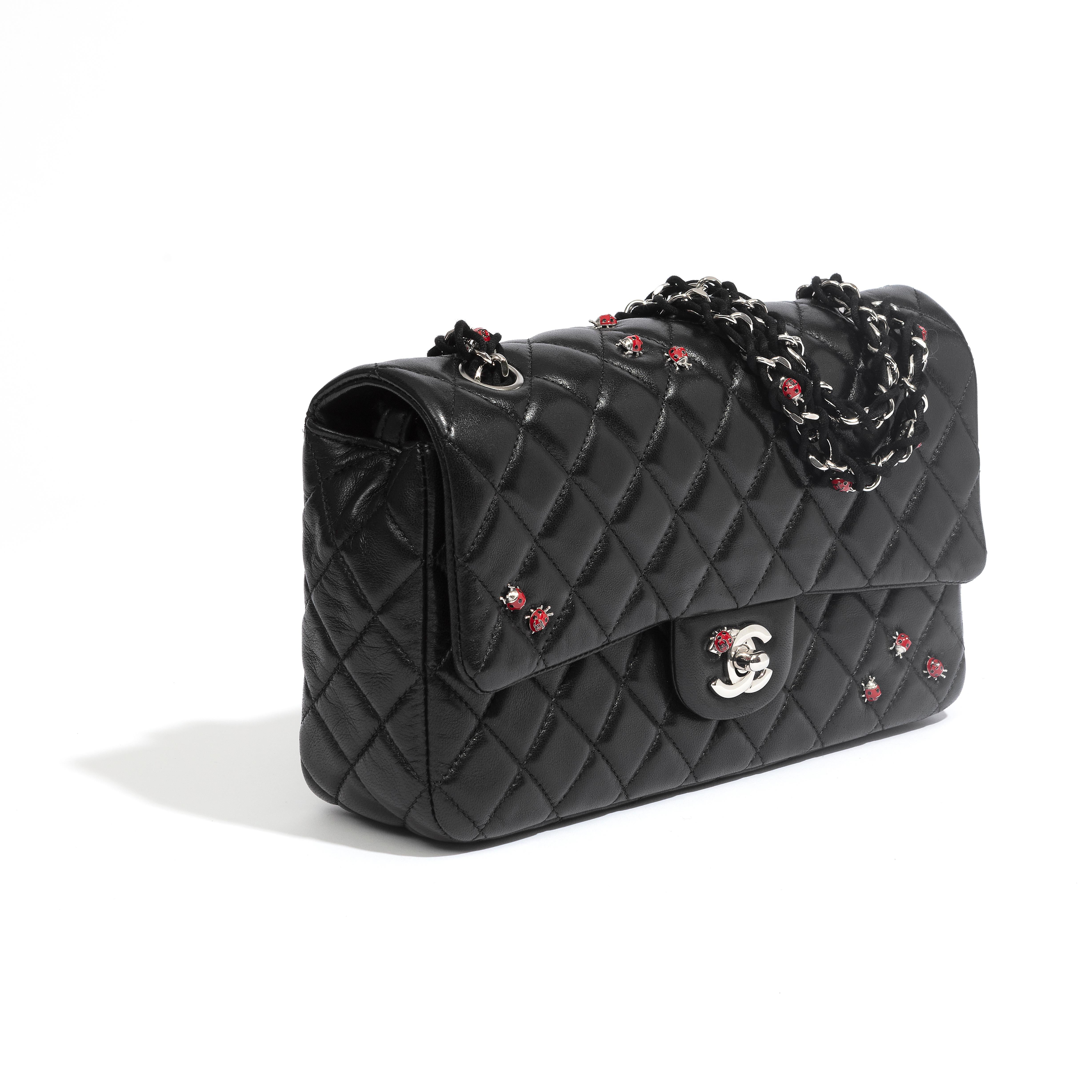 This stunning limited edition ladybug medium flap bag was featured during the 2011 Chanel Spring/Summer collection. 

* Black Quilted Lambskin
* Silver hardware
* The Interior is lined in a tonal textile
* Includes original authenticity card
*