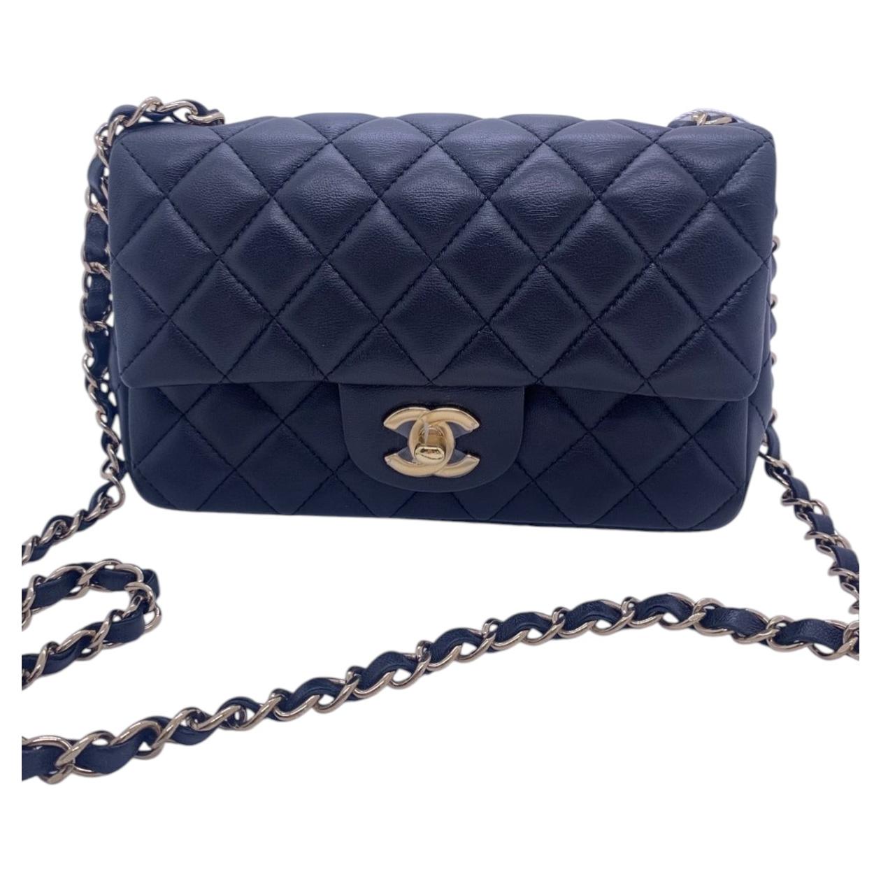 Chanel Classic Mini Flap Borsa nera trapuntata in pelle d'agnello GHW Hardware oro