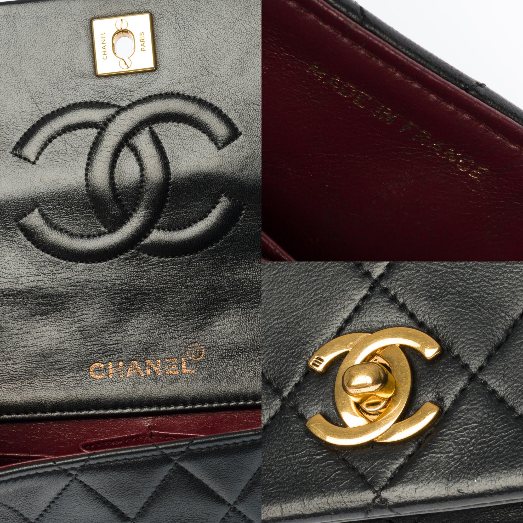 Women's Chanel Classic Mini Full Flap shoulder bag in black quilted leather and GHW