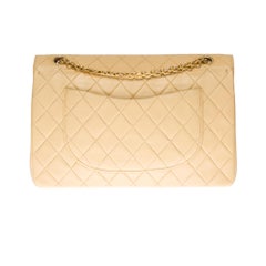 Chanel Classic shoulder bag in beige quilted lambskin and gold hardware