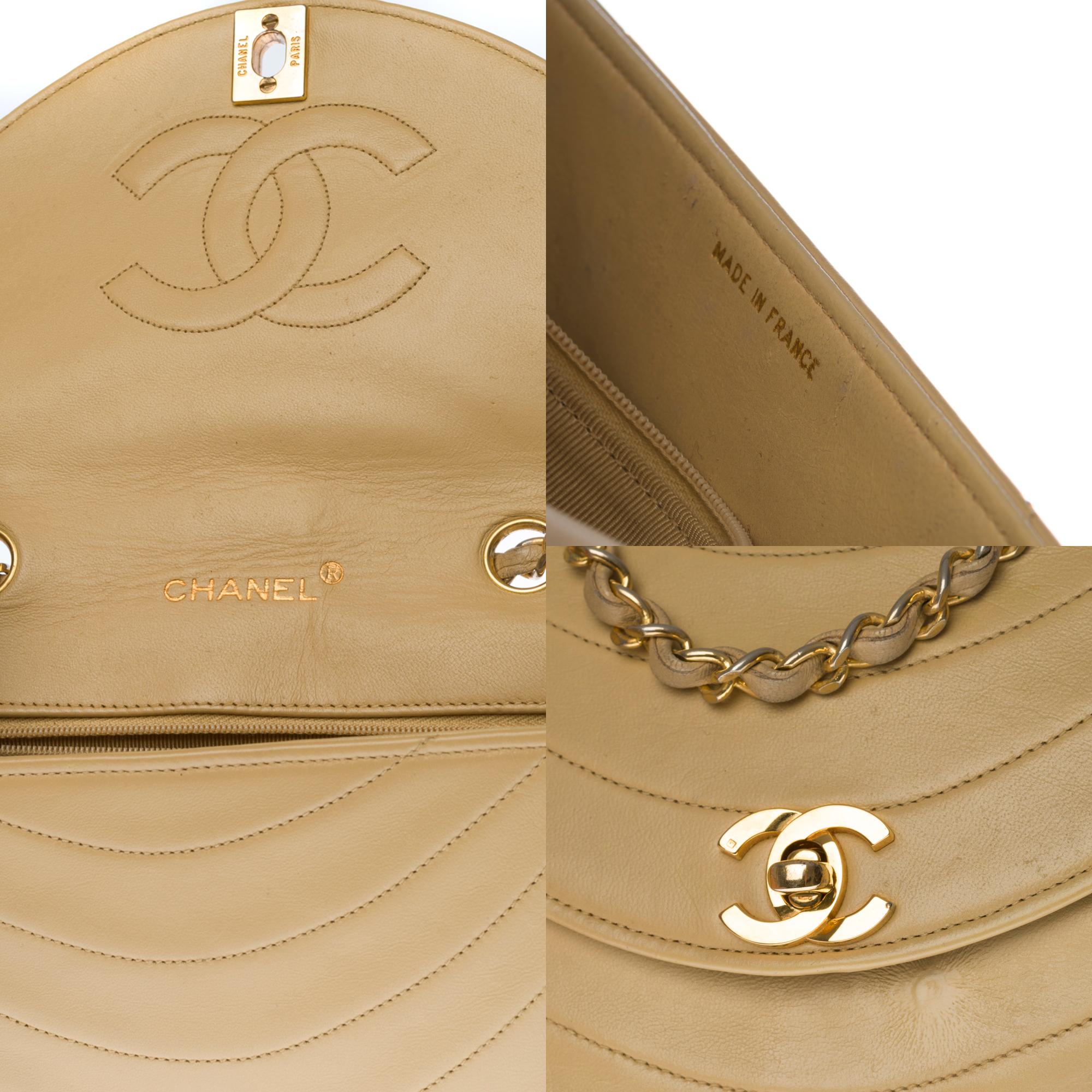 Women's Chanel Classic shoulder bag in beige quilted lambskin and gold hardware