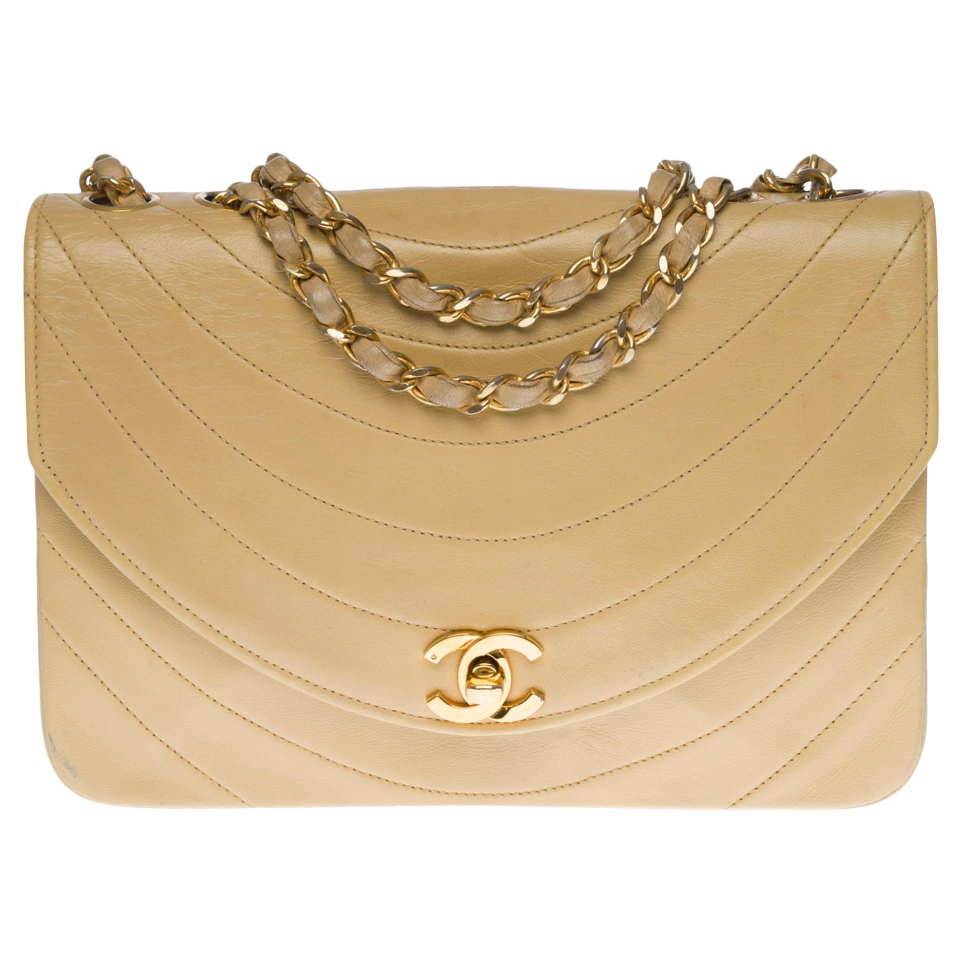 Chanel Classic shoulder bag in beige quilted lambskin and gold hardware