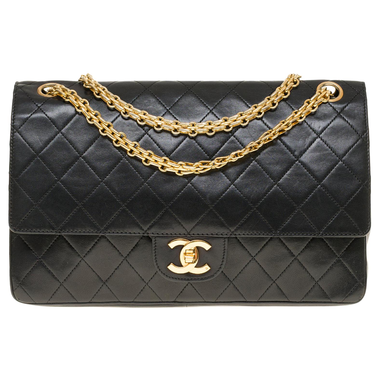 Chanel Classic shoulder bag in black quilted lambskin and gold hardware