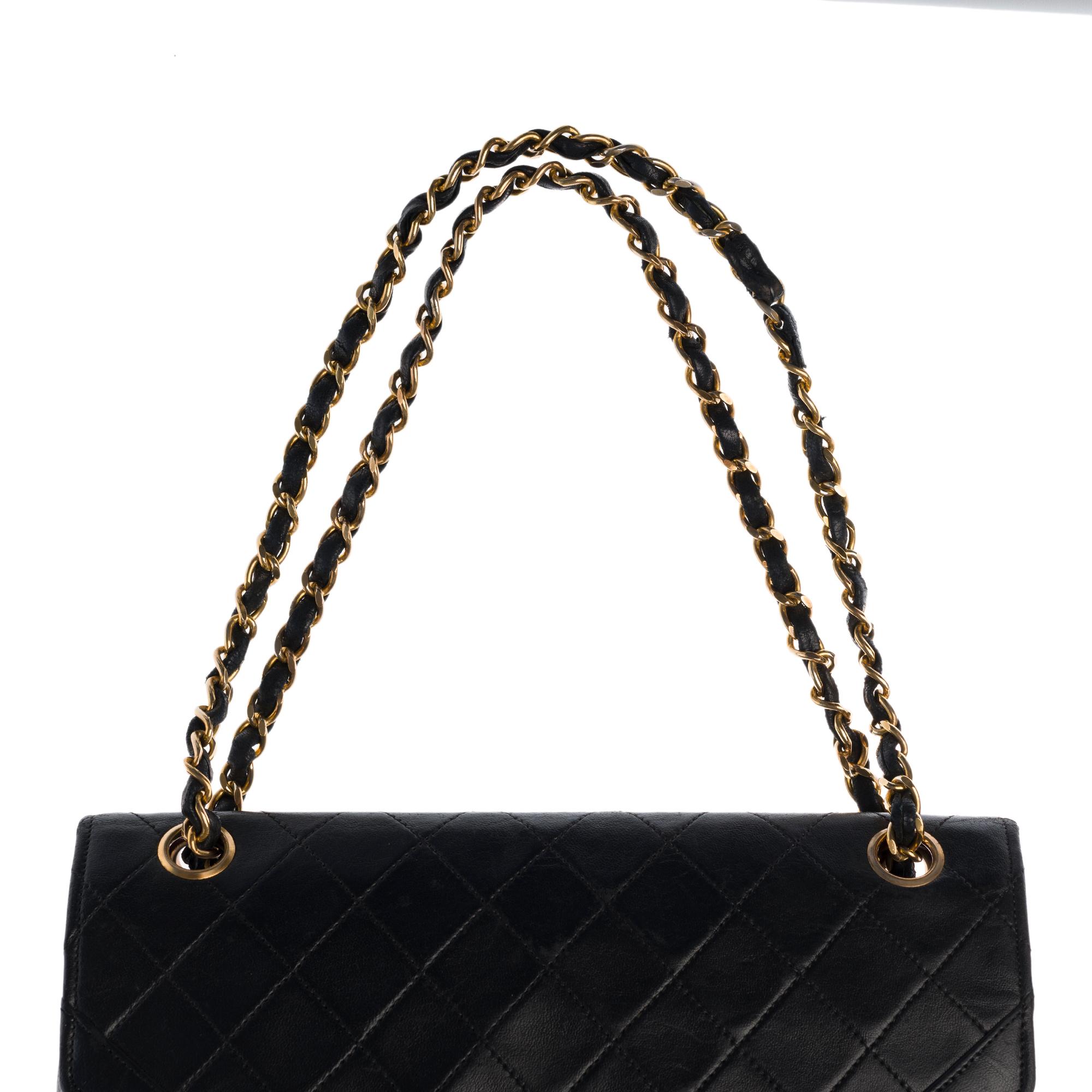 Chanel Classic Shoulder bag in black quilted leather and gold hardware 2