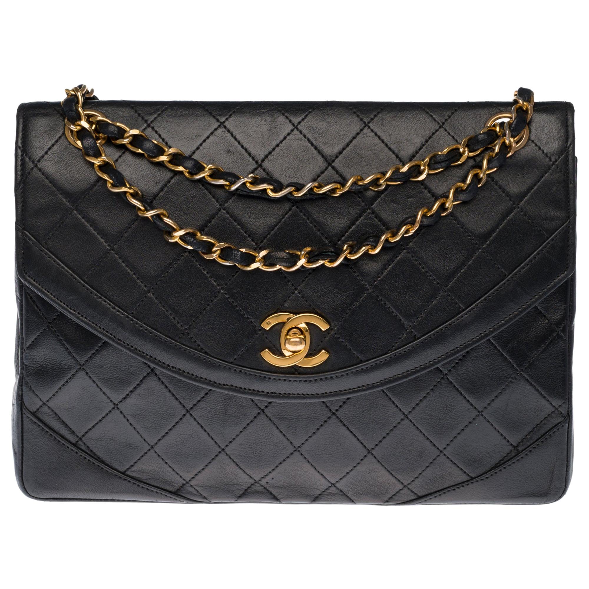 Chanel Classic Shoulder bag in black quilted leather and gold hardware