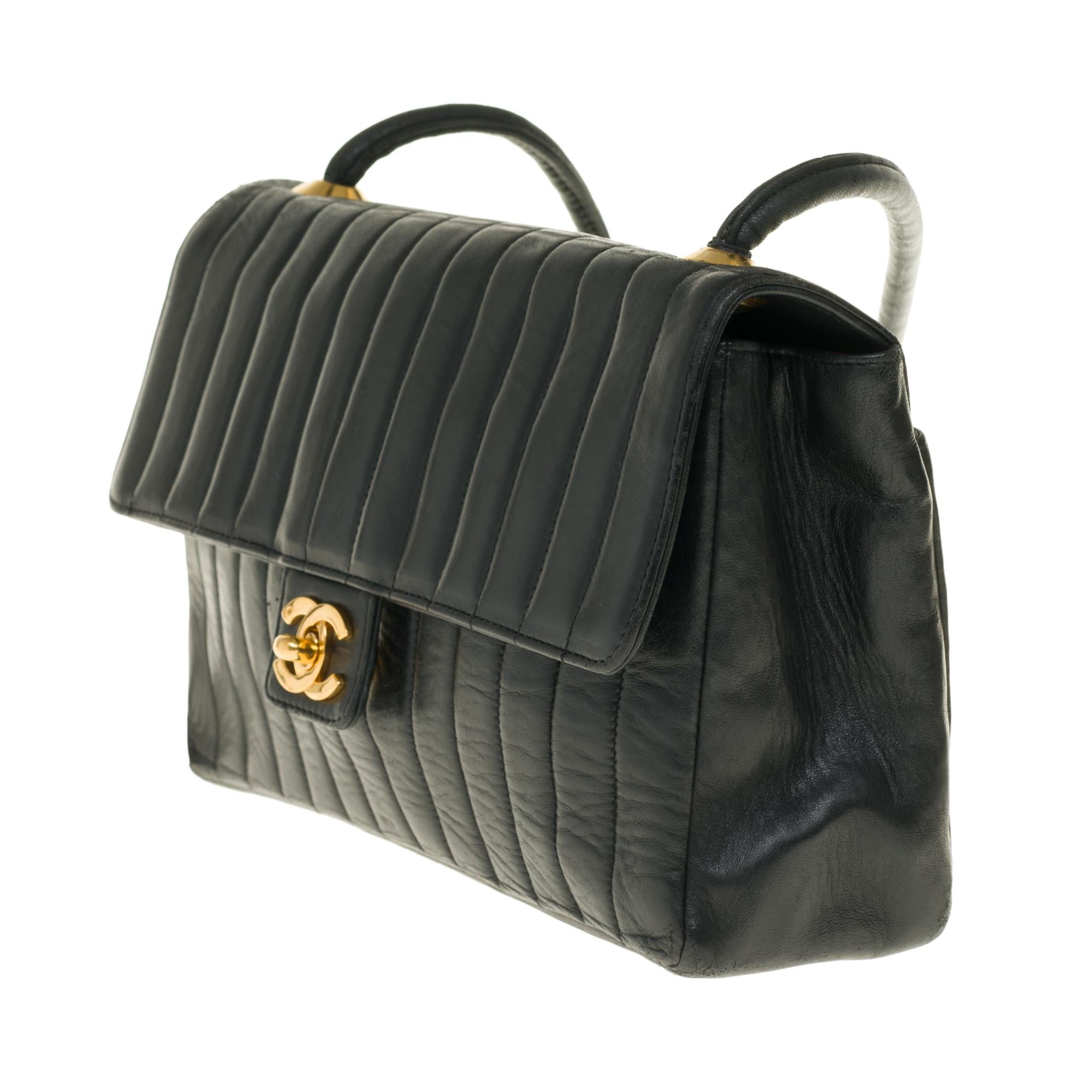 Black Chanel Classic shoulder bag in chevron black quilted lambskin with gold hardware