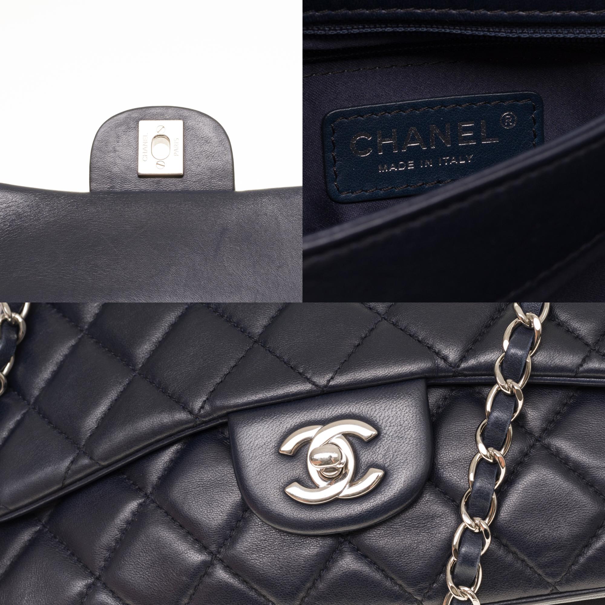 Women's Chanel Classic shoulder bag in Navy blue quilted lambskin leather, SHW