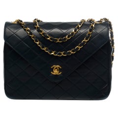Chanel Classic Shoulder bag in navy blue quilted leather and gold hardware