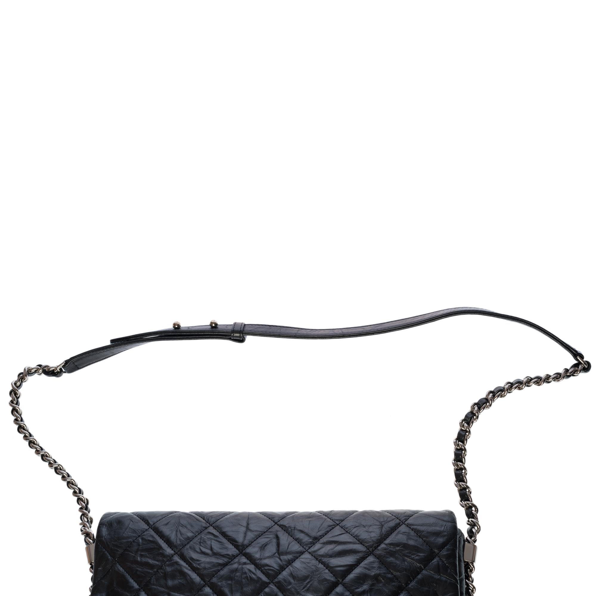 Women's Chanel Classic shoulder Flap bag in black quilted aged leather, SHW
