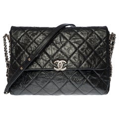 Chanel Classic shoulder Flap bag in black quilted aged leather, SHW