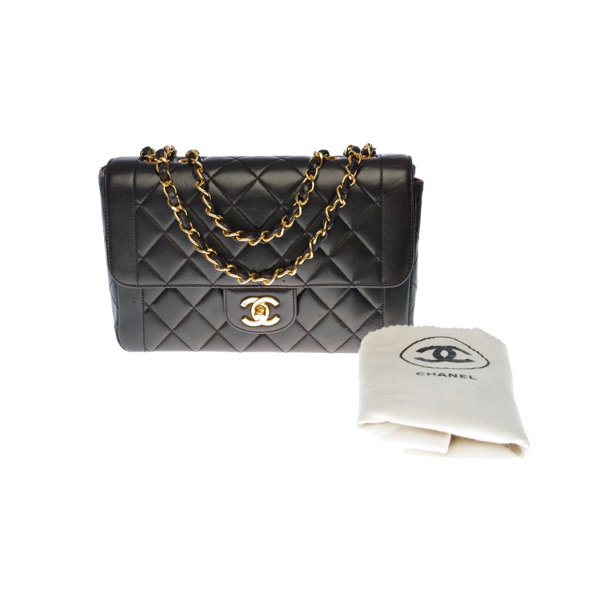 Chanel Classic shoulder Flap bag in black quilted lambskin and gold hardware 3