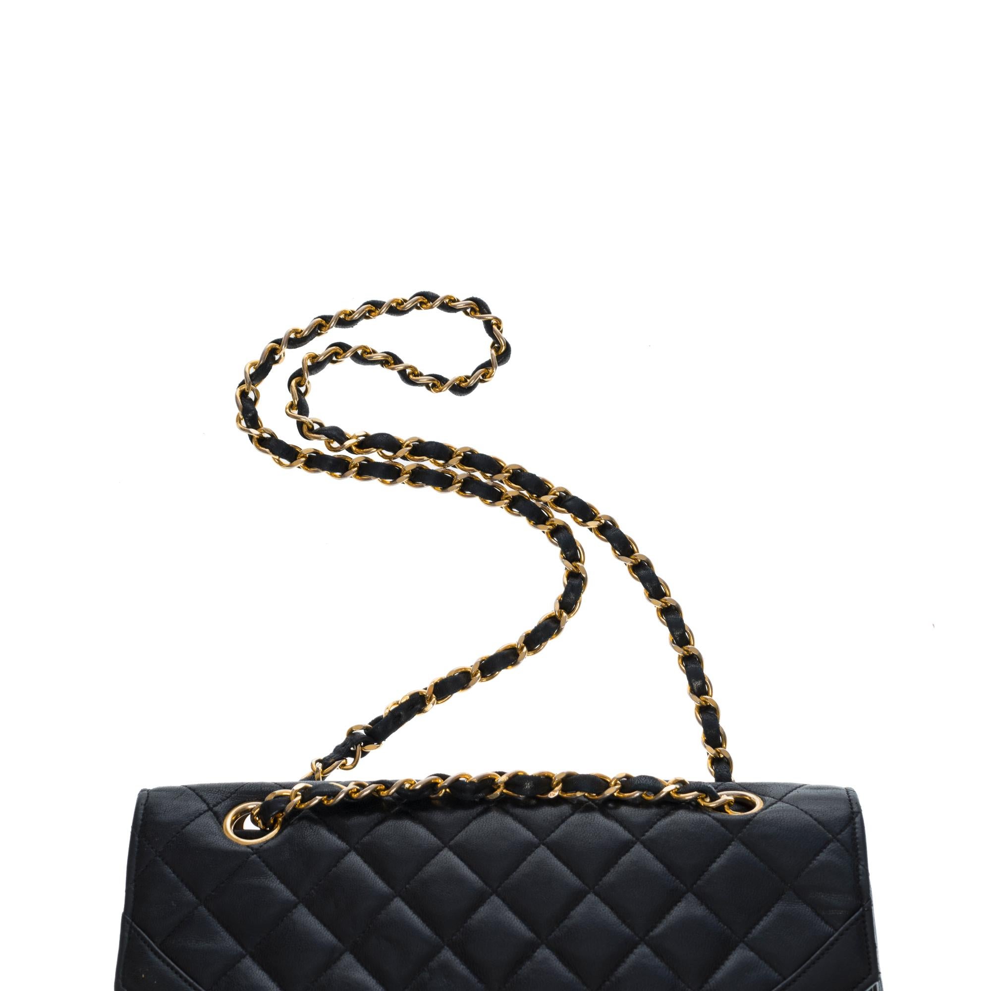 Chanel Classic shoulder Flap bag in black quilted lambskin and gold hardware 1