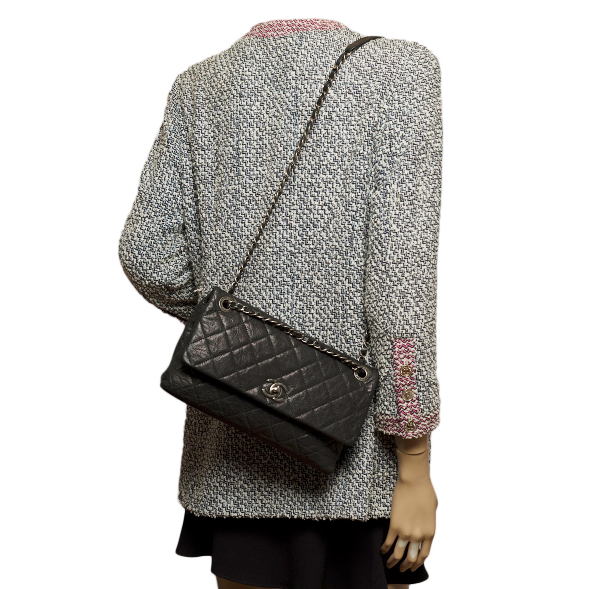 Chanel Classic shoulder Flap bag in black quilted leather and silver hardware 7