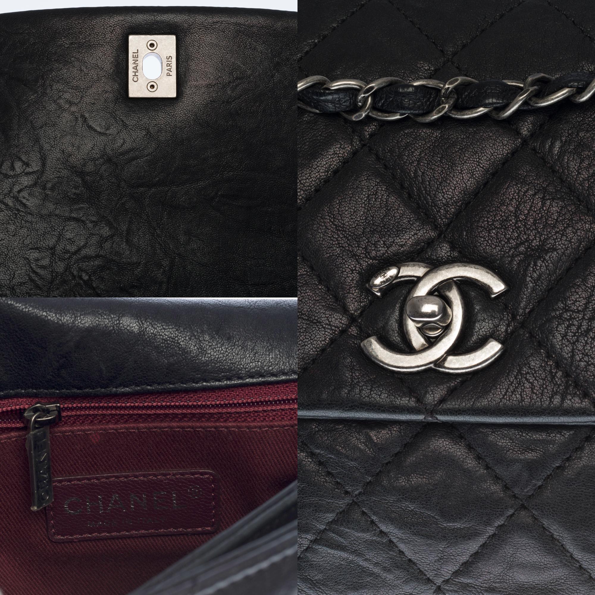 Women's Chanel Classic shoulder Flap bag in black quilted leather and silver hardware