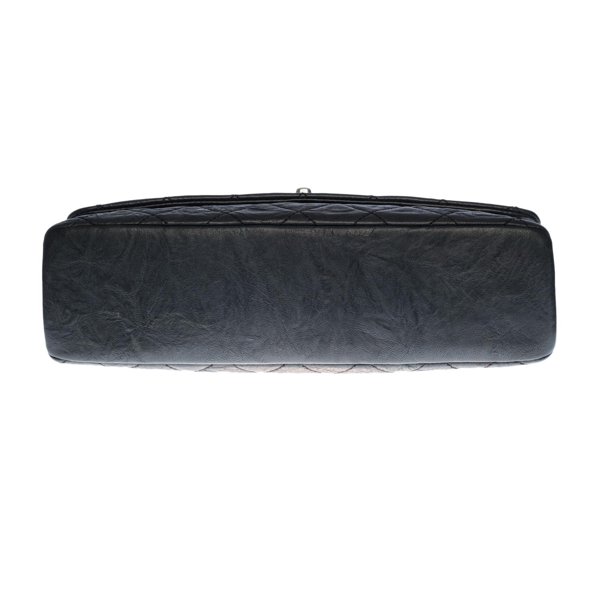 Chanel Classic shoulder Flap bag in black quilted leather and silver hardware 4