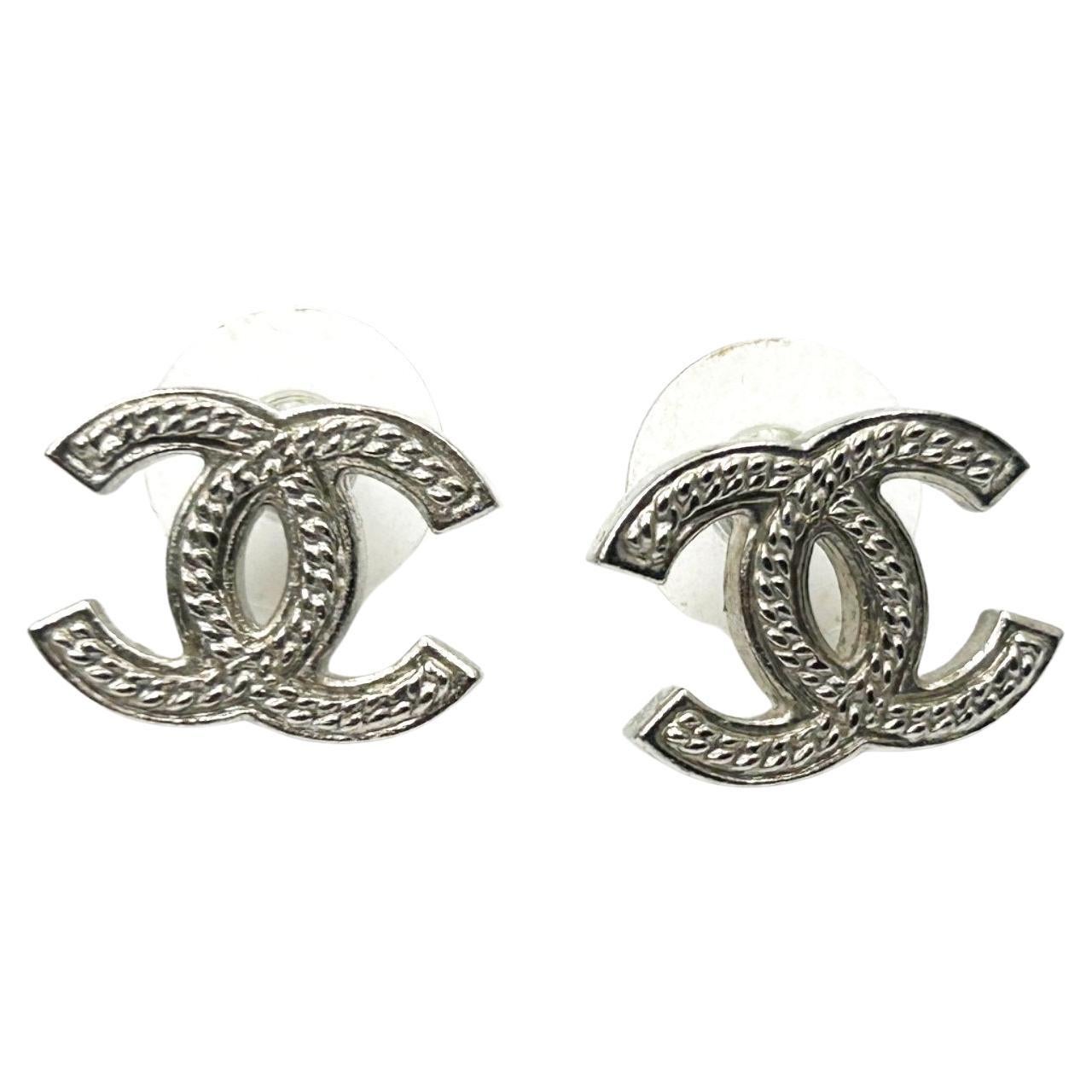 Chanel Classic Silver CC Rope Texture Piercing Earrings