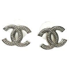 Chanel Classic Silver CC Rope Texture Piercing Earrings