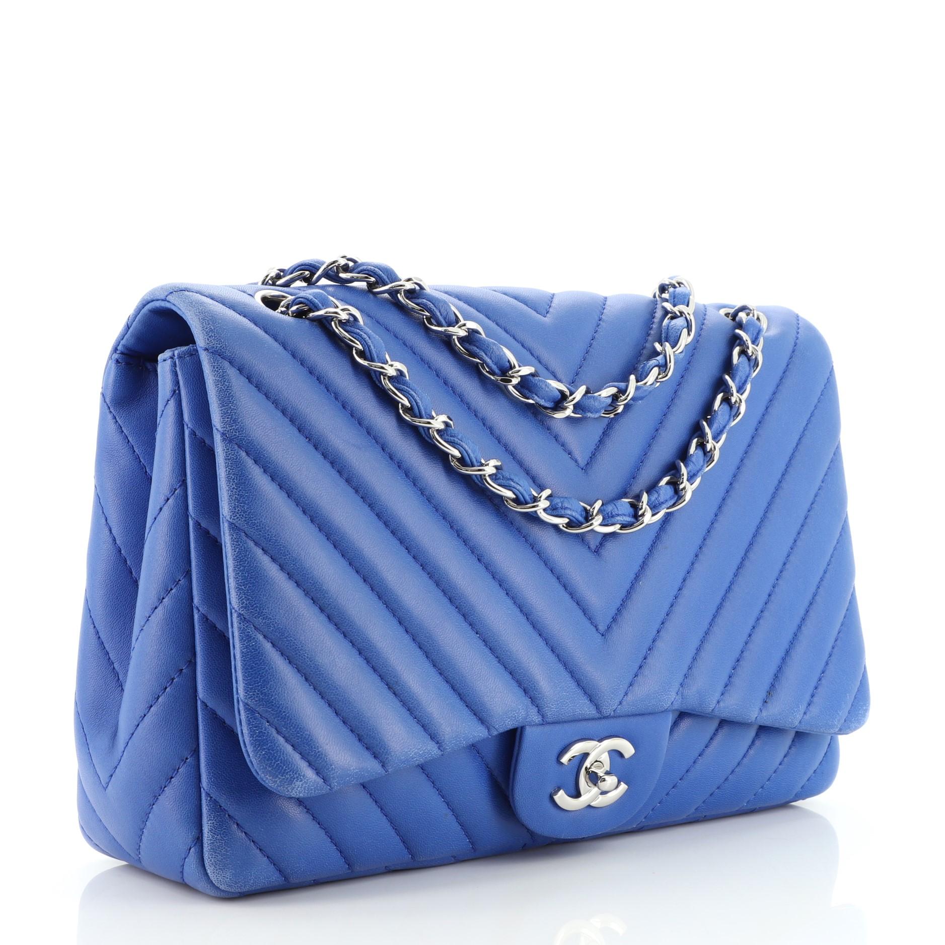 Chanel Classic Single Flap Bag Chevron Lambskin Jumbo. Odor in interior. Creasing, wear and scuffs on exterior, underneath flap and in interior, small indentations on base and rear pocket, heavy wear on exterior and flap edges. Moderate wear on