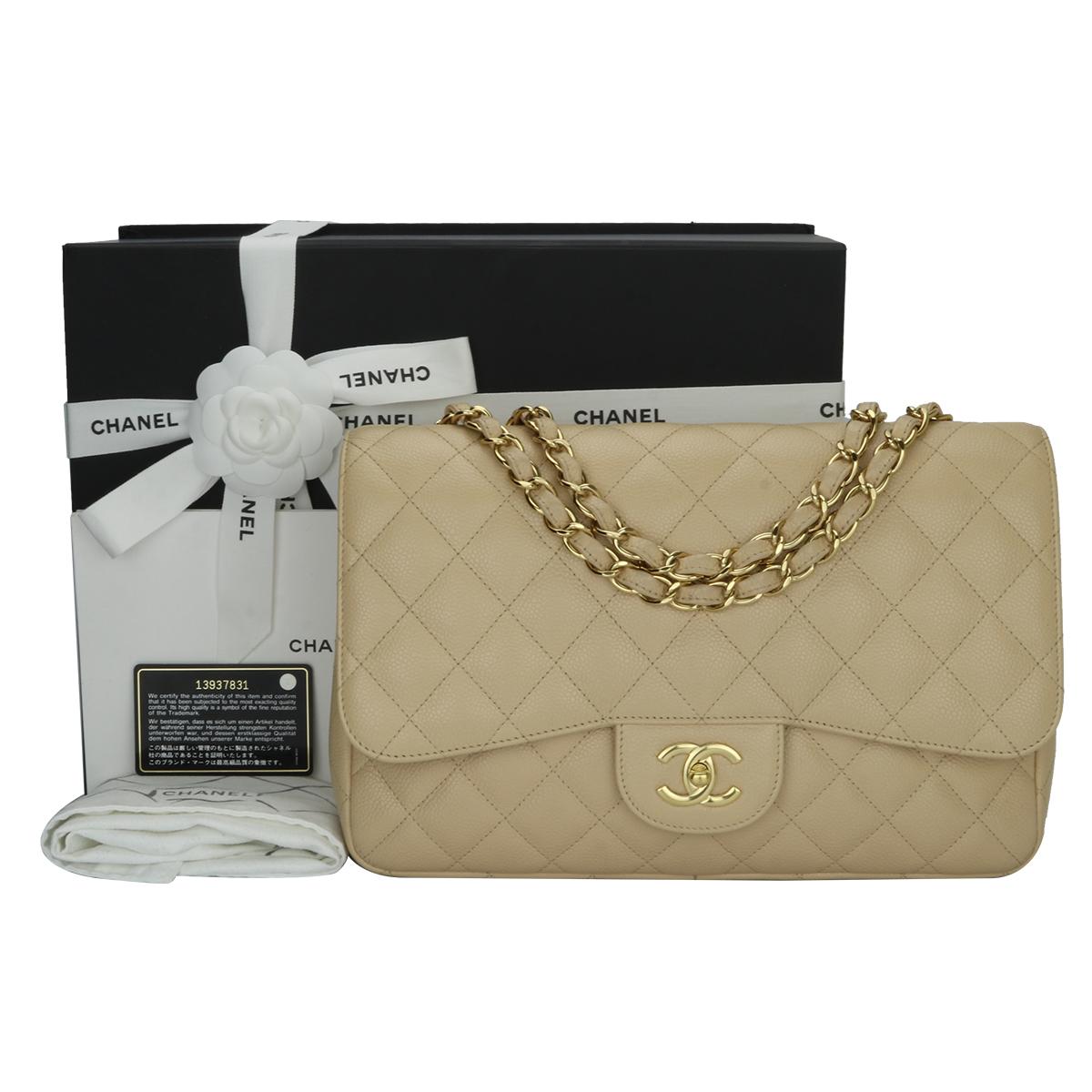 Authentic CHANEL Classic Single Flap Jumbo Bag Beige Clair Caviar with Gold Hardware 2009.

This stunning bag is in excellent condition, the bag still holds the original shape and the hardware is still very shiny.

Exterior Condition: Mint