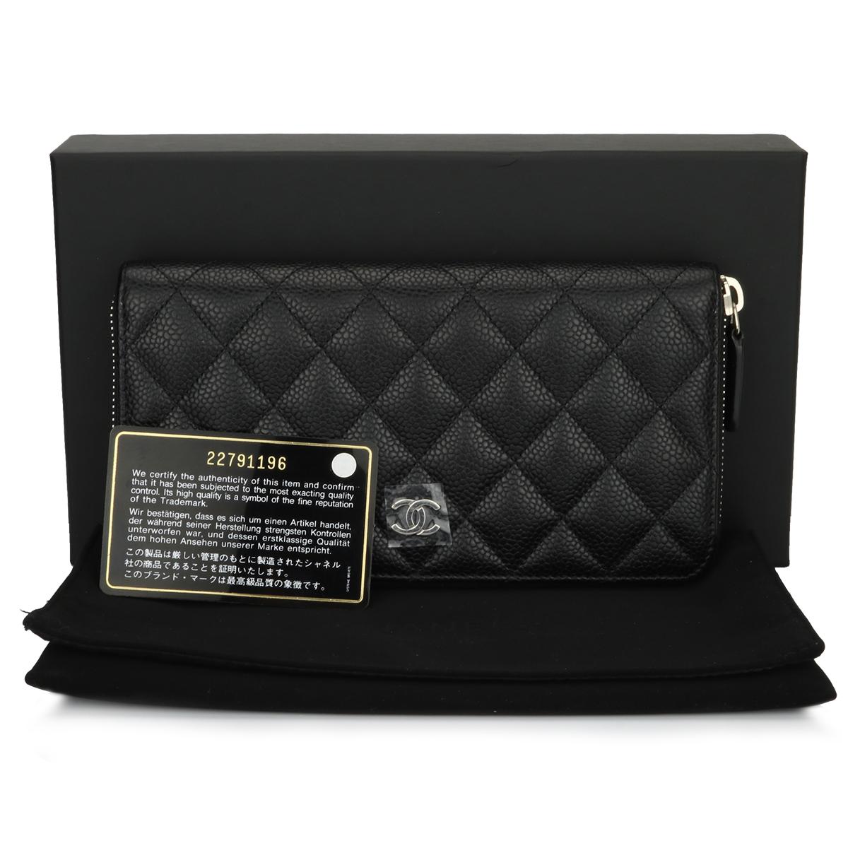 Authentic CHANEL Classic Zipped Wallet Black Caviar with Silver Hardware 2016.

This stunning wallet is in a mint condition, the wallet still holds its original shape, and the hardware is still very shiny.

Exterior Condition: Excellent condition,