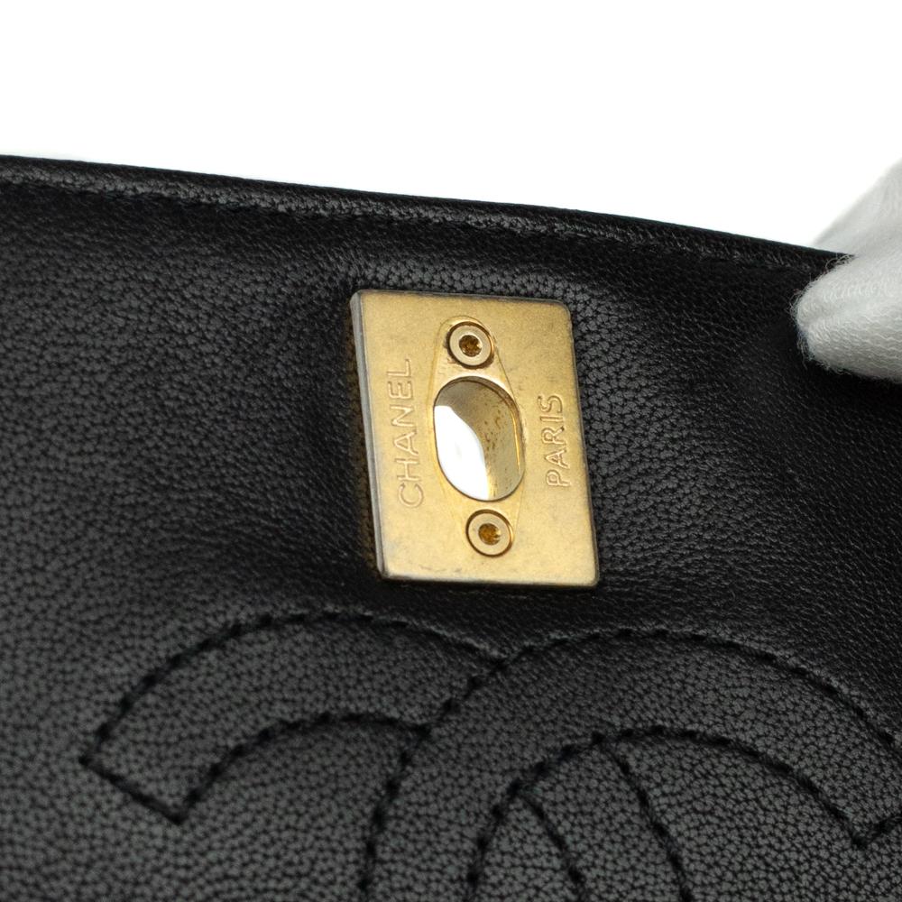 CHANEL, Classique Camélia in black leather For Sale 6