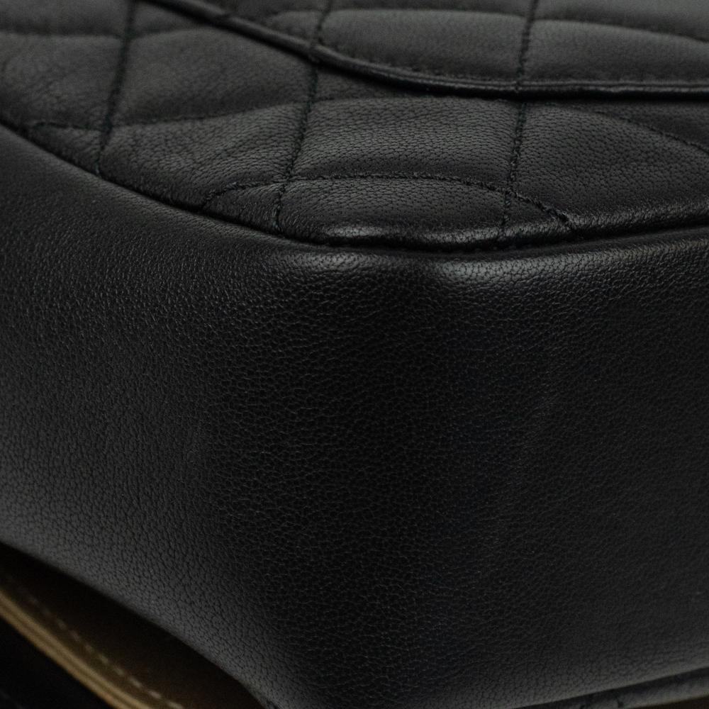 CHANEL, Classique Camélia in black leather For Sale 10