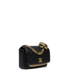 CHANEL, Classique Camélia in black leather