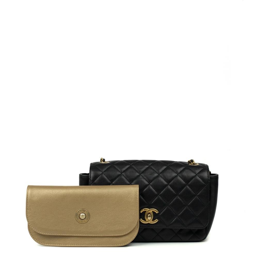 Women's CHANEL, Classique Camélia in black leather For Sale