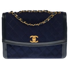Chanel Classique two-material bag in navy blue quilted jersey and leather, GHW