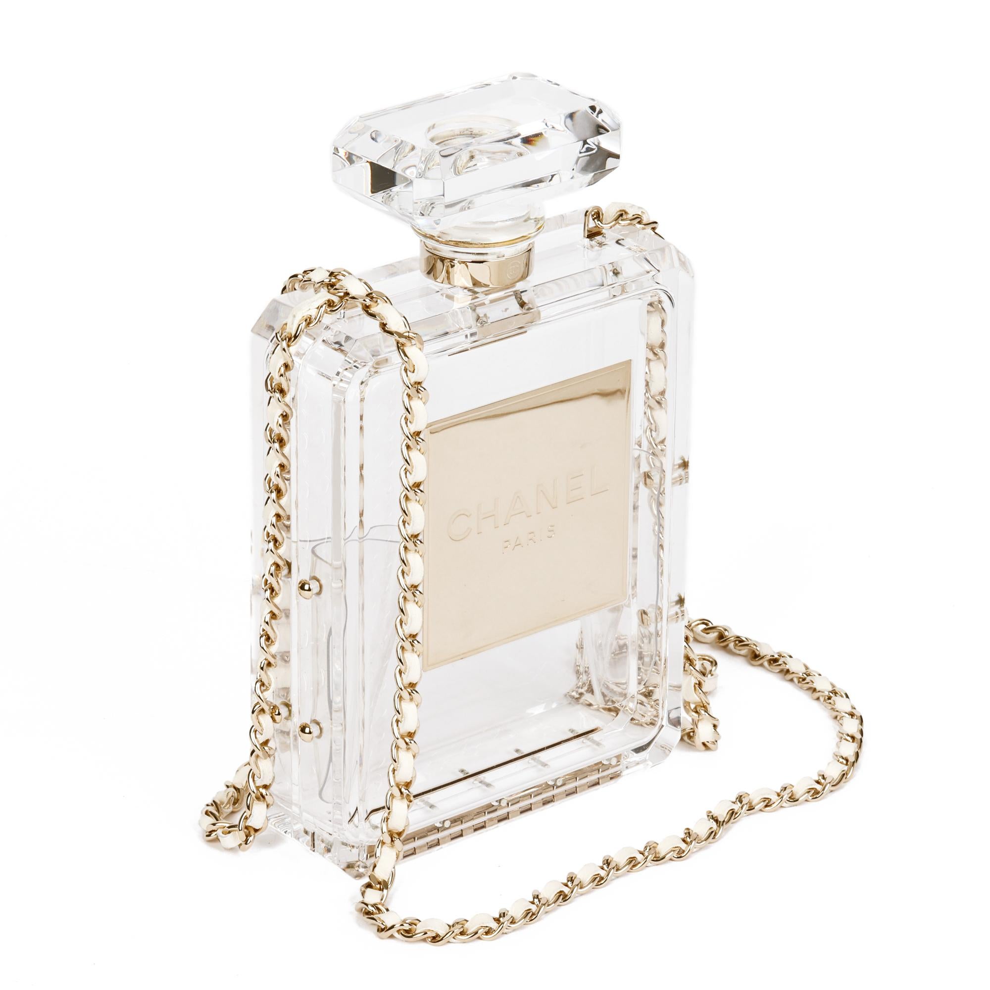 Chanel Clear Plexiglass Perfume Bottle Minaudière

CONDITION NOTES
The exterior is in exceptional condition with minimal signs of use.
The interior is in exceptional condition with minimal signs of use.
The hardware is in excellent condition with