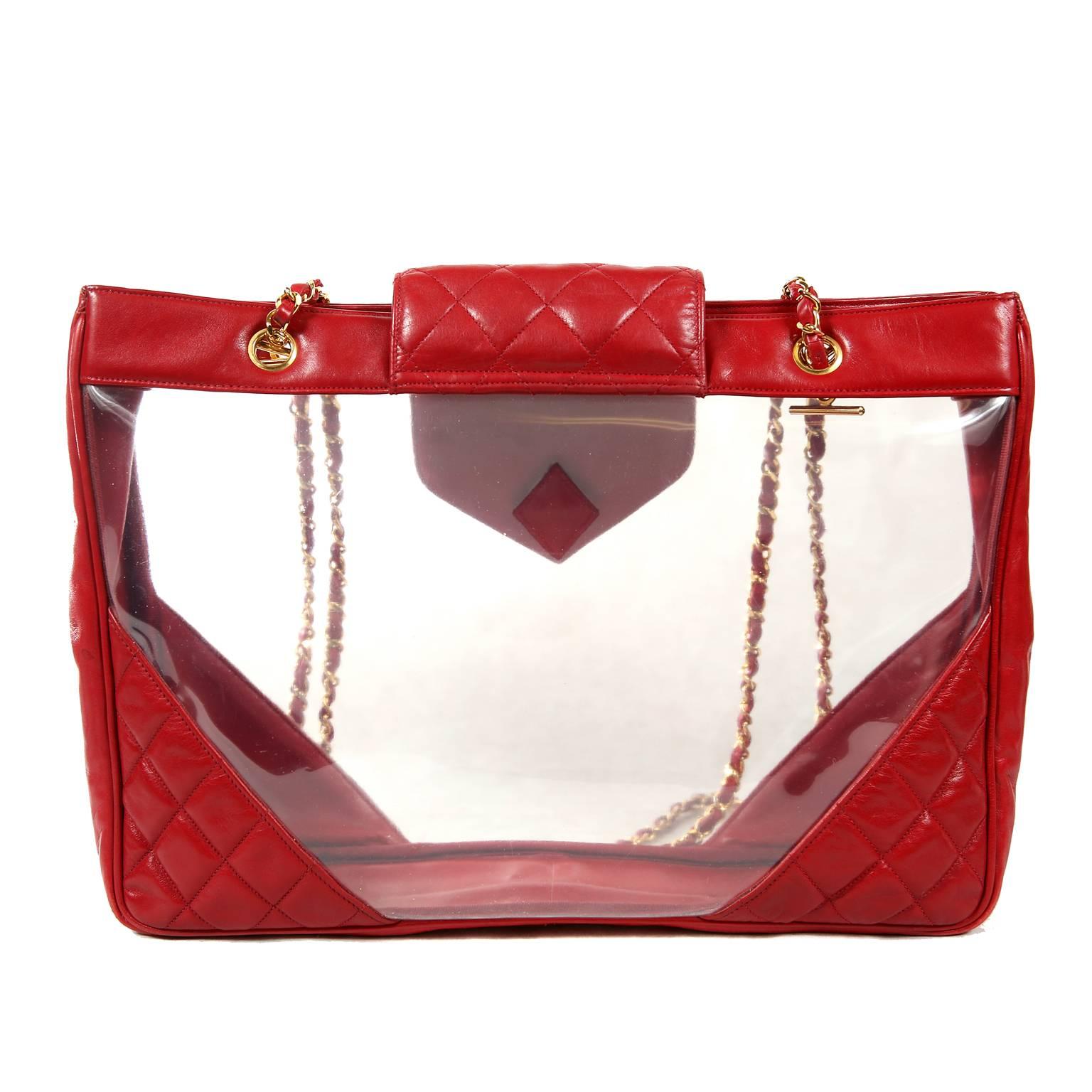 Chanel Vintage Clear PVC and Red Leather XL Tote- MINT condition
A very rare find, this stylish tote is truly timeless.  In fact, clear bags are in high demand among fashionistas this season.
Clear PVC extra large tote is framed with bright red