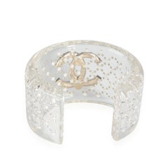 Chanel Bracelet jonc large à bretelles en résine transparente et perles avec double logo en forme de C