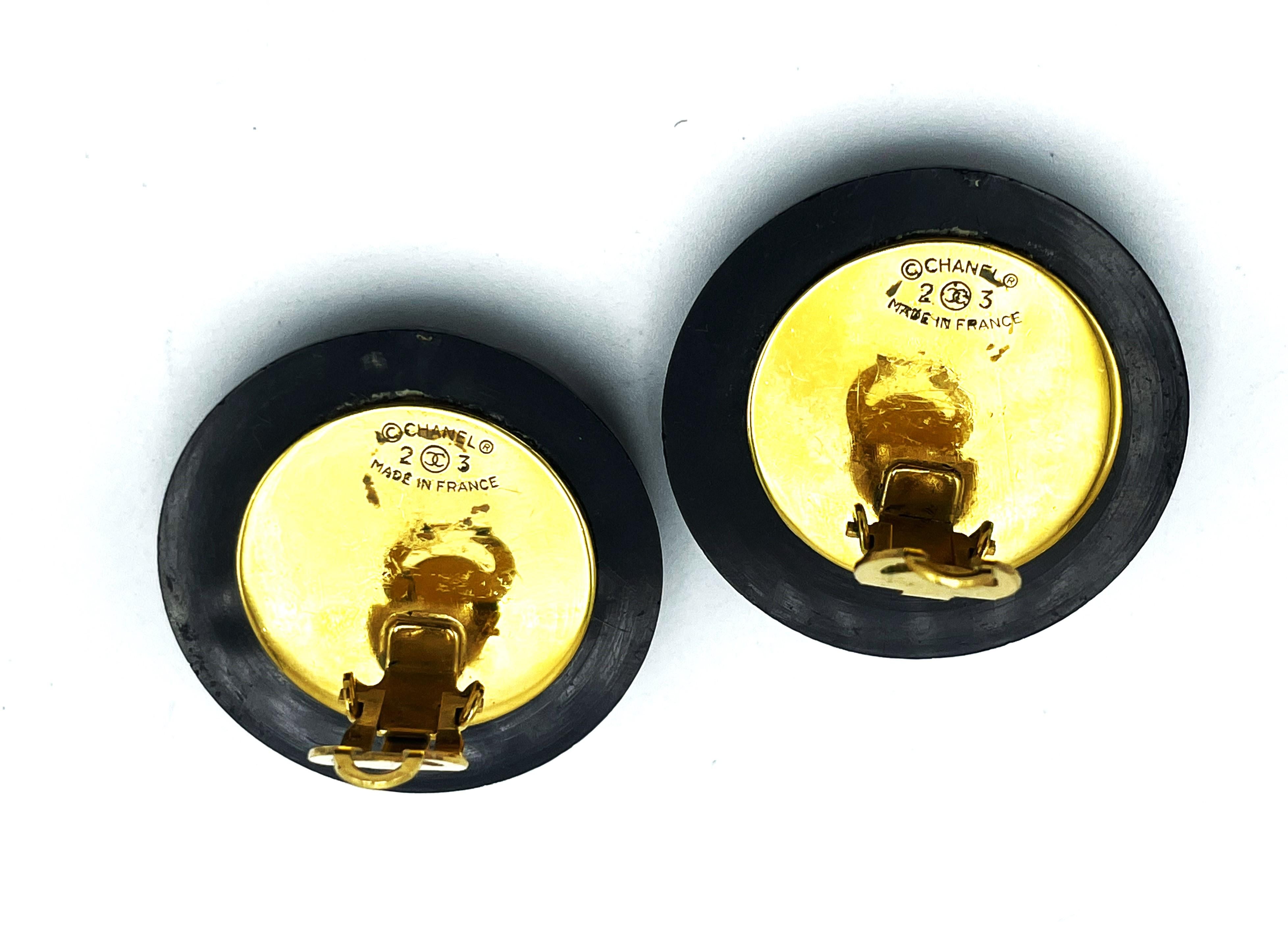CHANEL Clip-on earring, black Bakelite  with iconic CC, singed 2CC3 = 1985 2