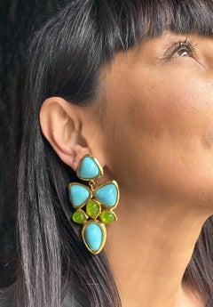 CHANEL CLIP-ON EARRING, blue and green glass paste from Maison Gripoix, 1993 A