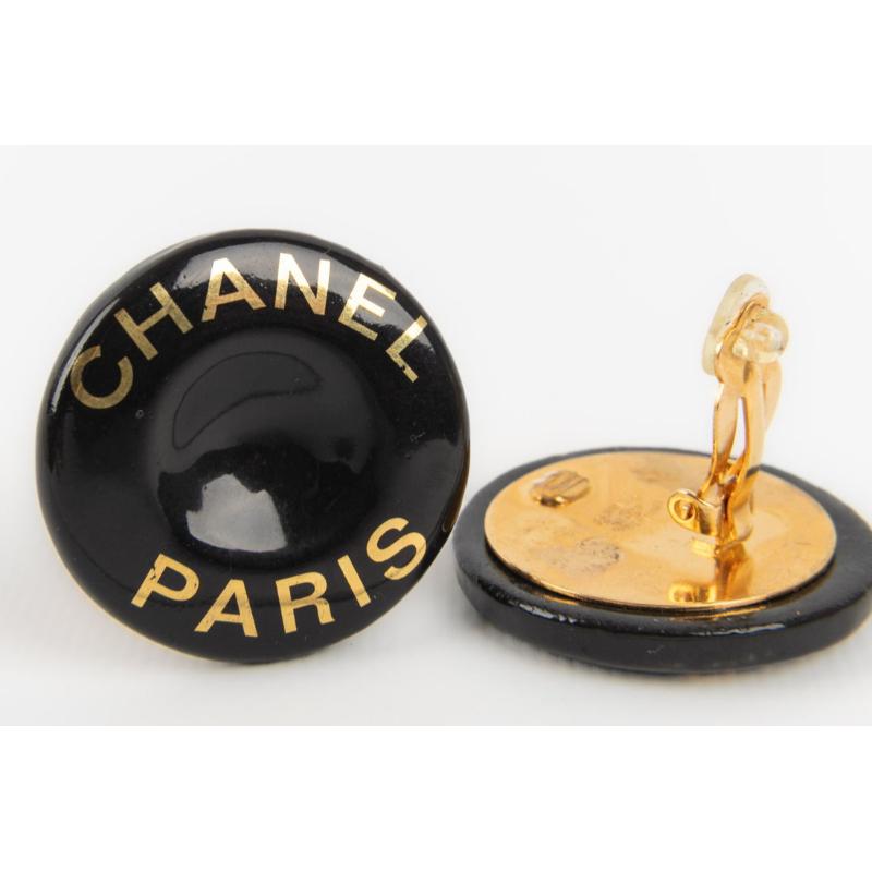 Women's Chanel Clip-on Earrings in Golden Metal and Black Bakelite Spring, 1997 For Sale