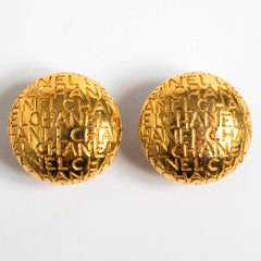Chanel Clip On Engraved Gold Metal Earrings. Stamped CR Chanel, 1990-92.
