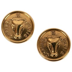 Pendientes Chanel Clips en metal dorado