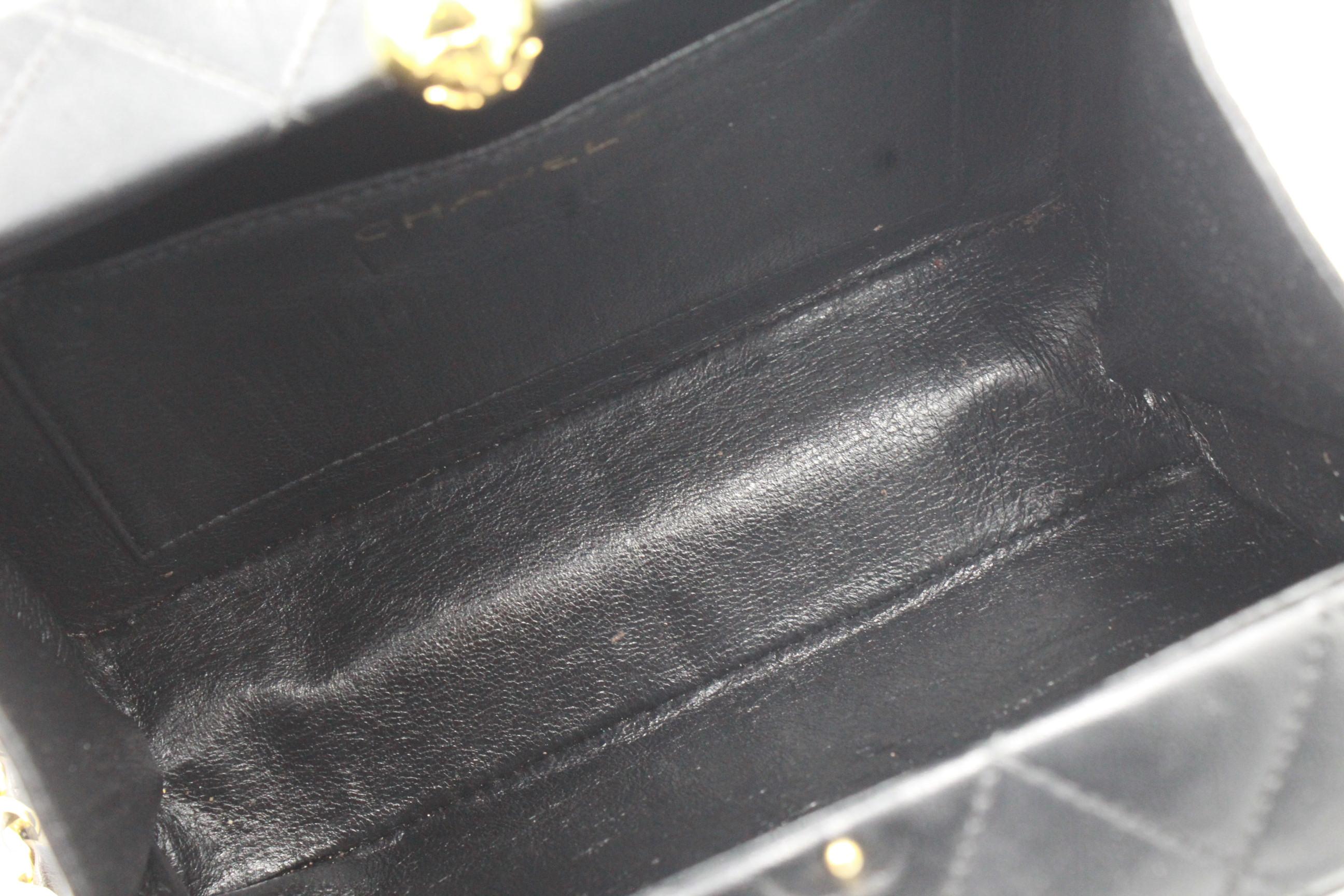Chanel clutch shoulder bag in black leather 1