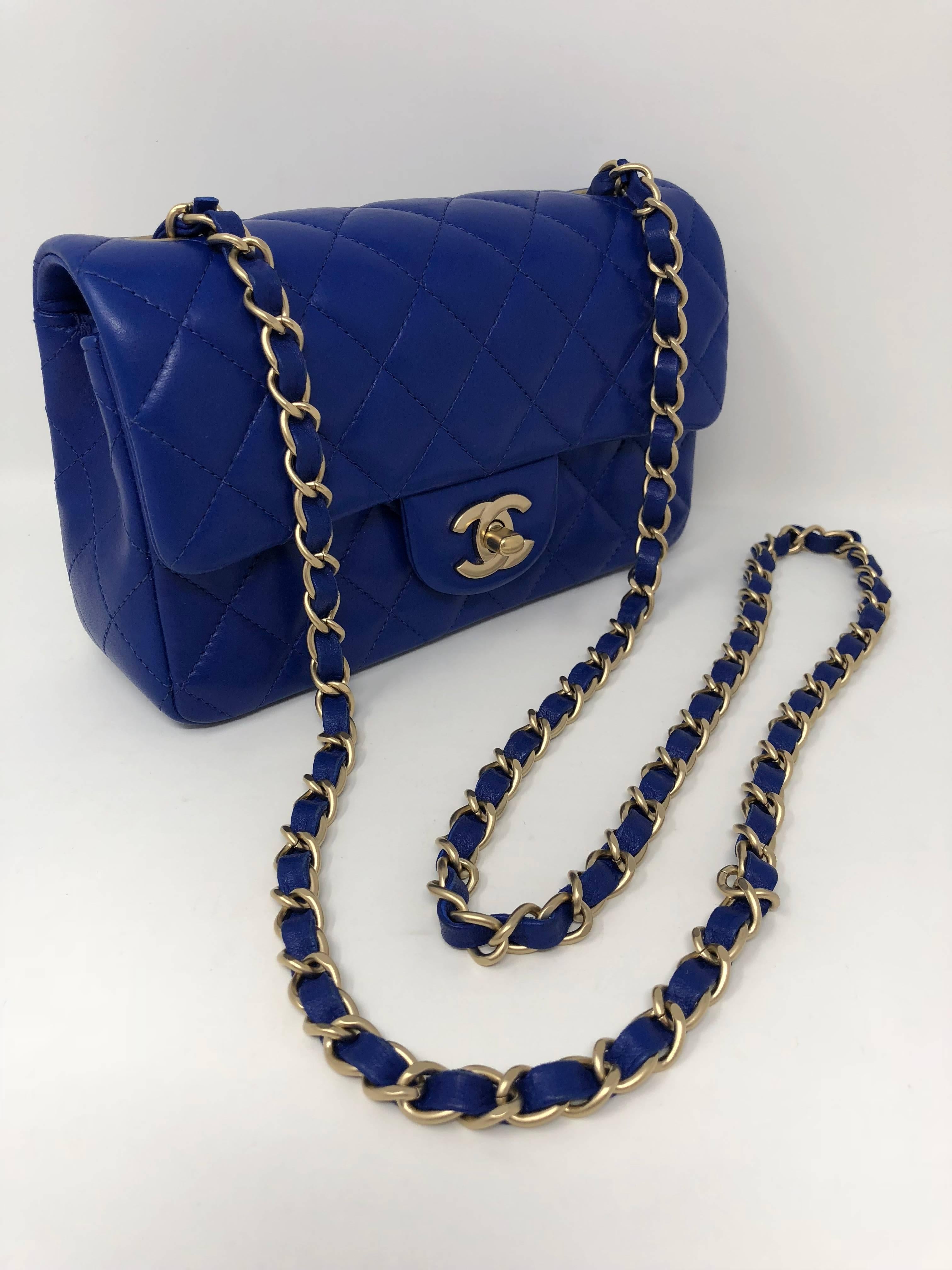 Brand new condition Chanel Cobalt Blue Mini with matte gold hardware. Can be worn crossbody or as a shoulder bag. Leather is like new. Sold out and hard to find. Includes serial card number. Guaranteed authentic.