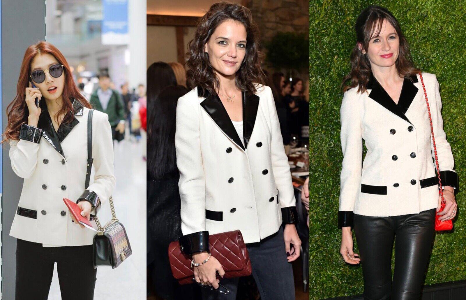 Chaqueta Chanel Coco Chanel de tweed negro con botones de camelia CC 38 FR en Nuevo estado para la venta en Dubai, AE
