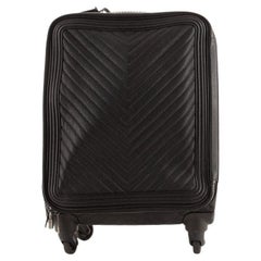 chanel rolling luggage