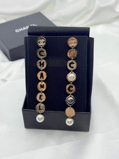 Chanel COCO CHANEL Gold Disc Pearl Dangle Statement Earrings