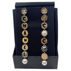 Chanel COCO CHANEL Gold Disc Pearl Dangle Statement Earrings