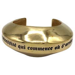 CHANEL Coco Chanel Massive Gold Tone Quote Cuff Bracelet