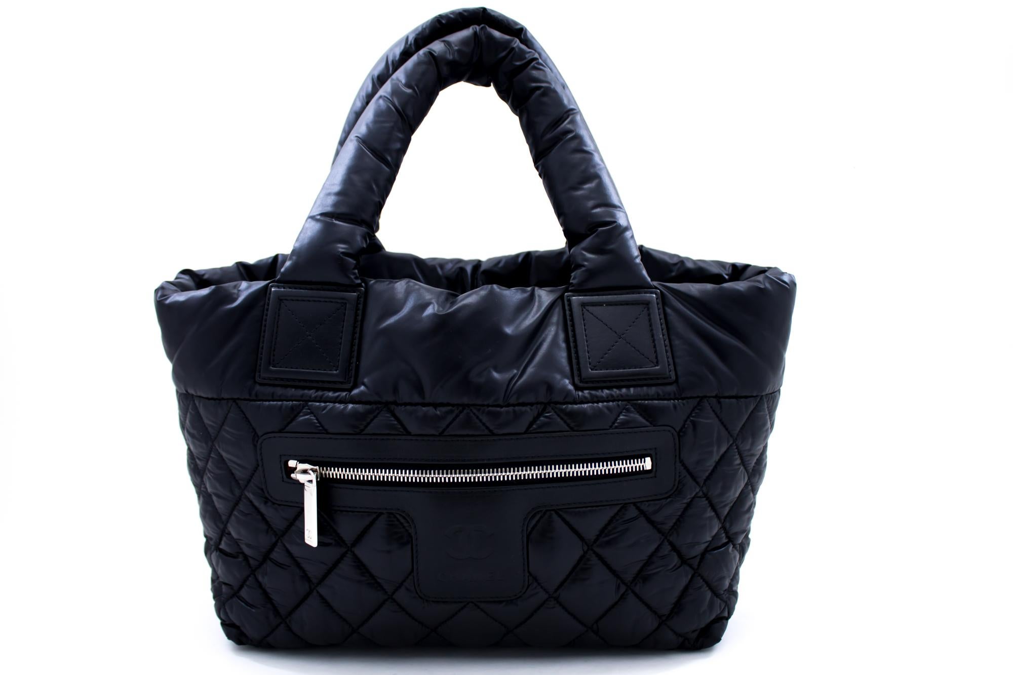 An authentic CHANEL Coco Cocoon Nylon Tote Bag Handbag Black Bordeaux Leather. The color is Black. The outside material is Nylon. The pattern is Solid. This item is Contemporary. The year of manufacture would be 2012.
Conditions & Ratings
Outside