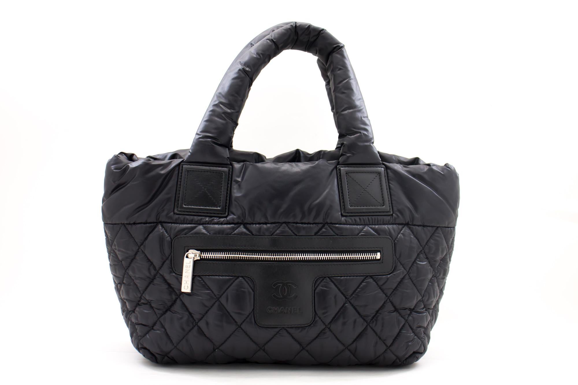 An authentic CHANEL Coco Cocoon PM Nylon Tote Bag Handbag Black Leather. The color is Black. The outside material is Nylon. The pattern is Solid. This item is Contemporary. The year of manufacture would be 2012.
Conditions & Ratings
Outside