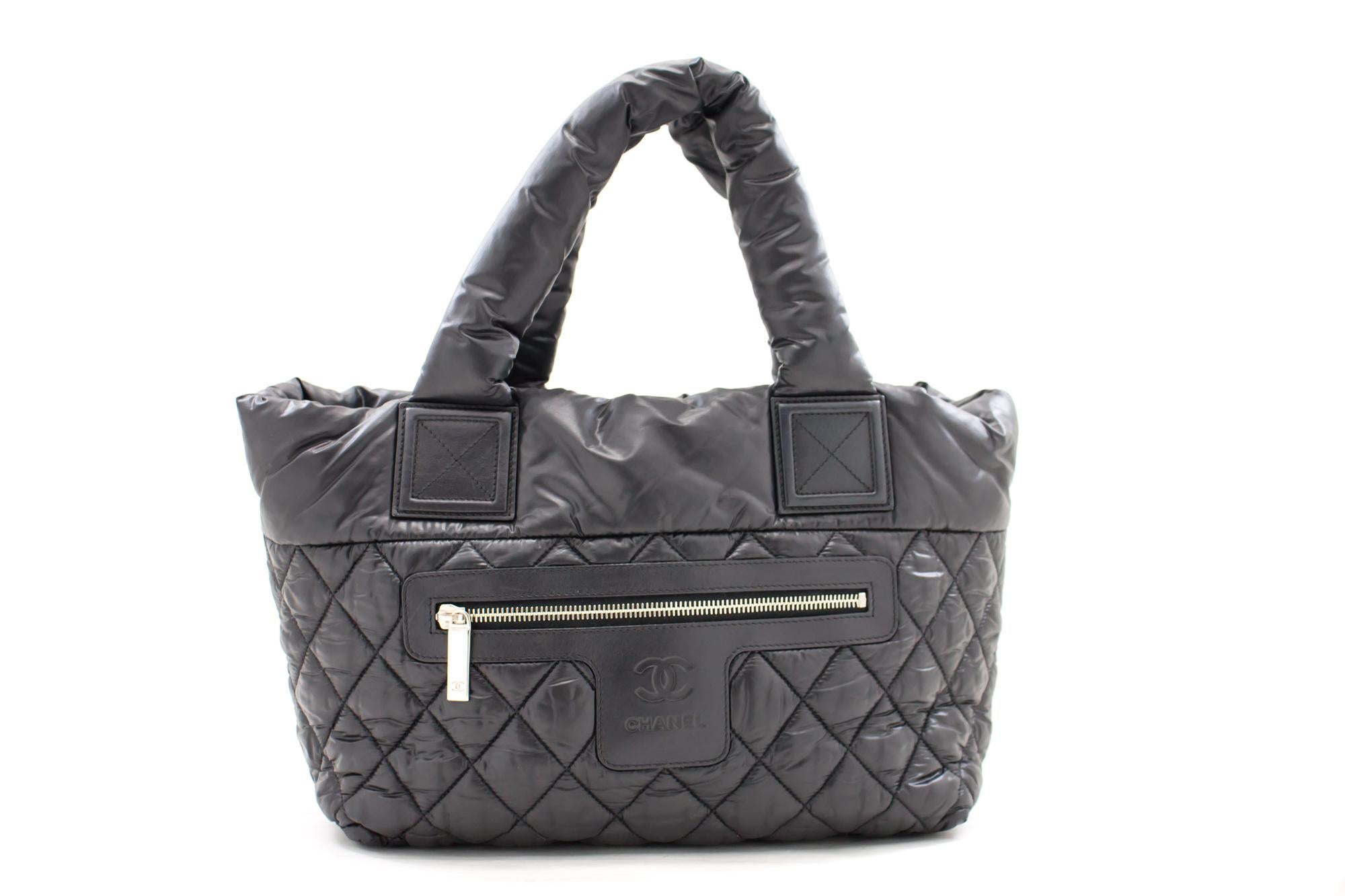 An authentic CHANEL Coco Cocoon PM Nylon Tote Bag Handbag Black Leather. The color is Black. The outside material is Nylon. The pattern is Solid. This item is Contemporary. The year of manufacture would be 2011.
Conditions & Ratings
Outside