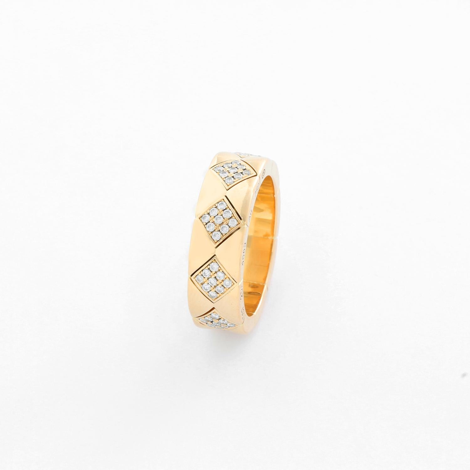 18K Yellow gold quilted pattern also known as Matelasse ring. This ring inspires femininity and modernity –two concepts that define Chanel– are intertwined in these jewels with cluster of diamonds. Size 8.5