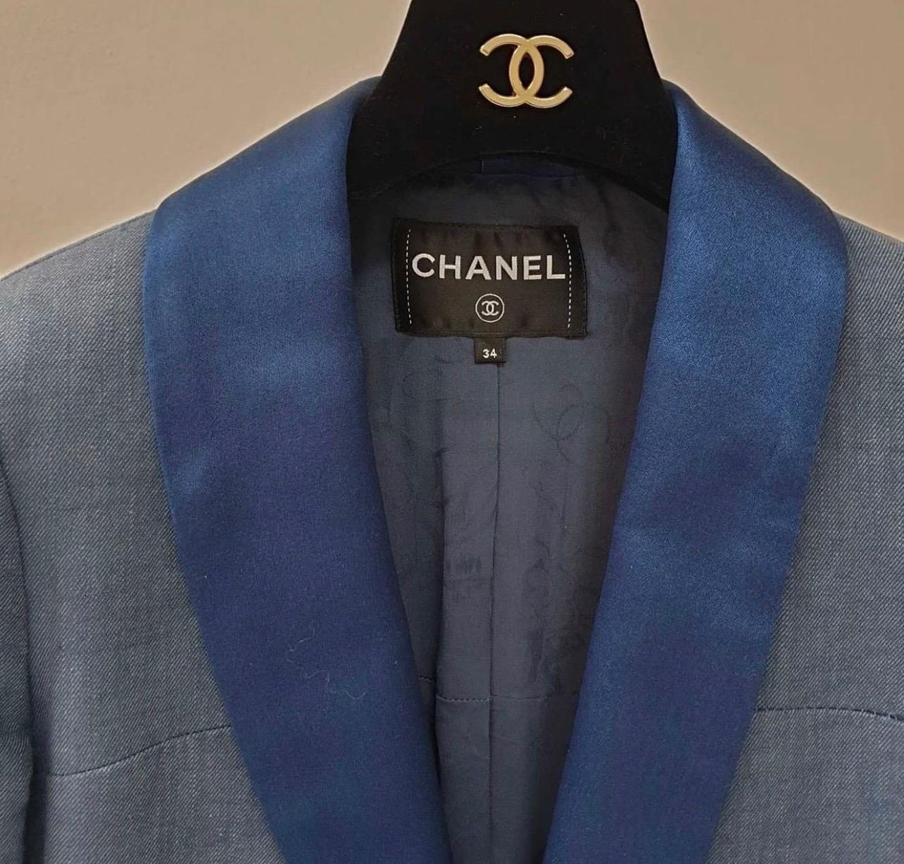 CHANEL 17C Coco Cuba Runway Blazer Jacket with Silk Satin Collar in Blue, 
Size 34 FR.  
With camellia print silk lining and chain weighted hem.
Condition is very good.
For buyers from EU we can provide shipping from Poland. Please demand if you