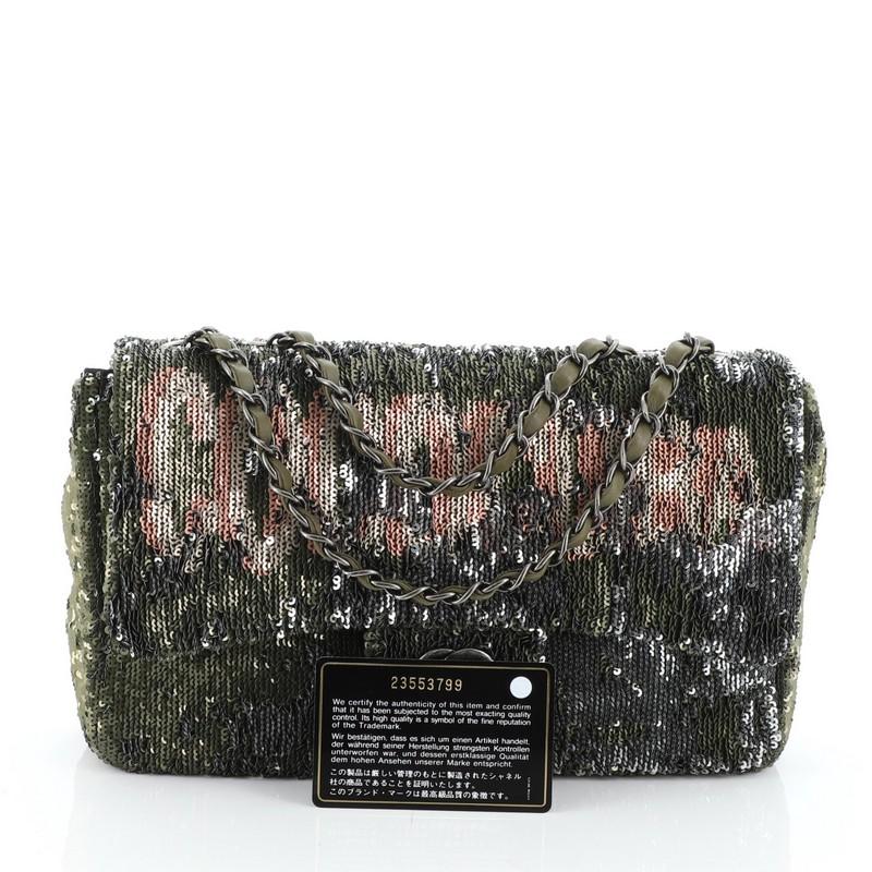 This Chanel Coco Cuba Flap Bag Sequins Medium, crafted in green sequins, features woven-in leather chain link strap and aged silver-tone hardware. Its CC turn-lock closure opens to a green fabric interior with zip and slip pockets. Hologram sticker